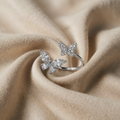 Hvidguldfarvet dobbelt sommerfugl zirconia ring