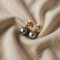 Elegante sorte perleøreringe med zirkonia