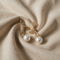 Pearl Earrings with Shimmering Bow