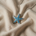 Silver Necklace with Shimmering Blue Starfish and Opal