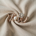 ROSE GOLD "LOVE" BROOCH