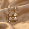 Earrings with Cultured Pearls and Studded Balls