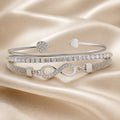 Armbåndssæt med rhinsten i hvidguld og infinity-design
