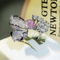 FUNKLENDE BLOMSTERBLADS RING - (JUSTERBAR)